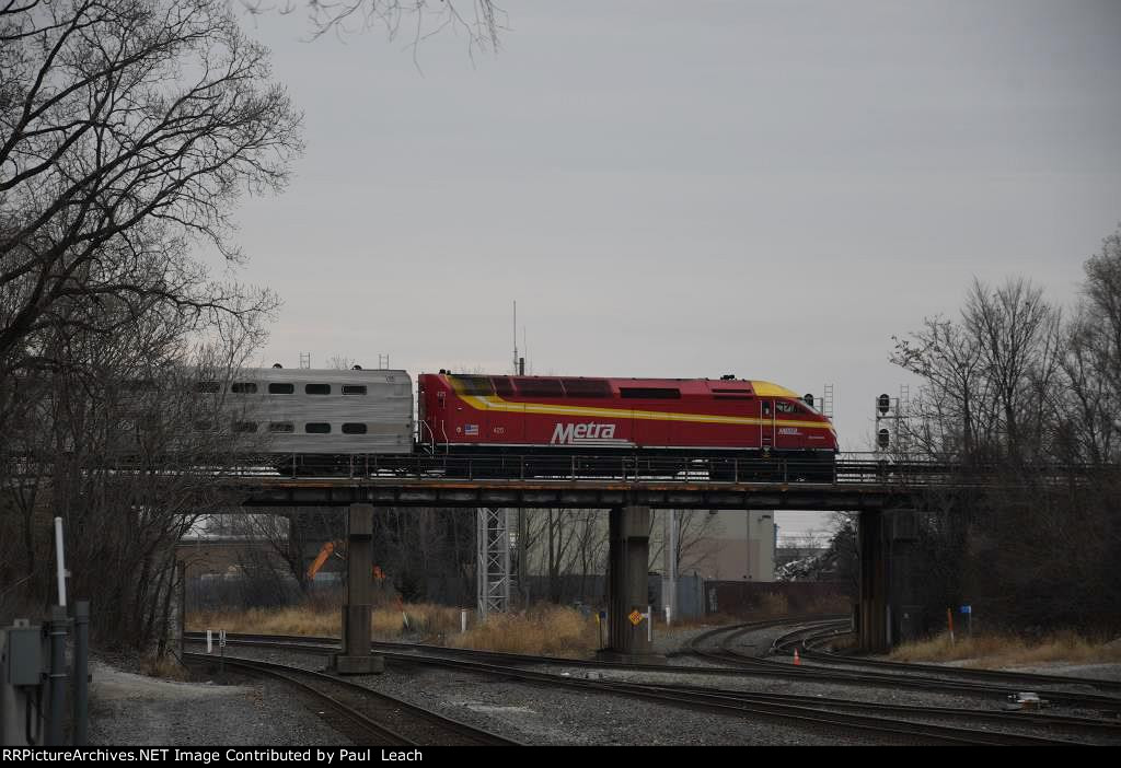 Outbound commuter rolls west